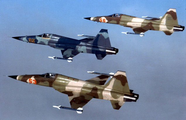 A trio of three US Air Force aggressor Northrop F-5E aircraft over England in 1983. These aircraft are painted to resemble Soviet fighters. (US Air Force)